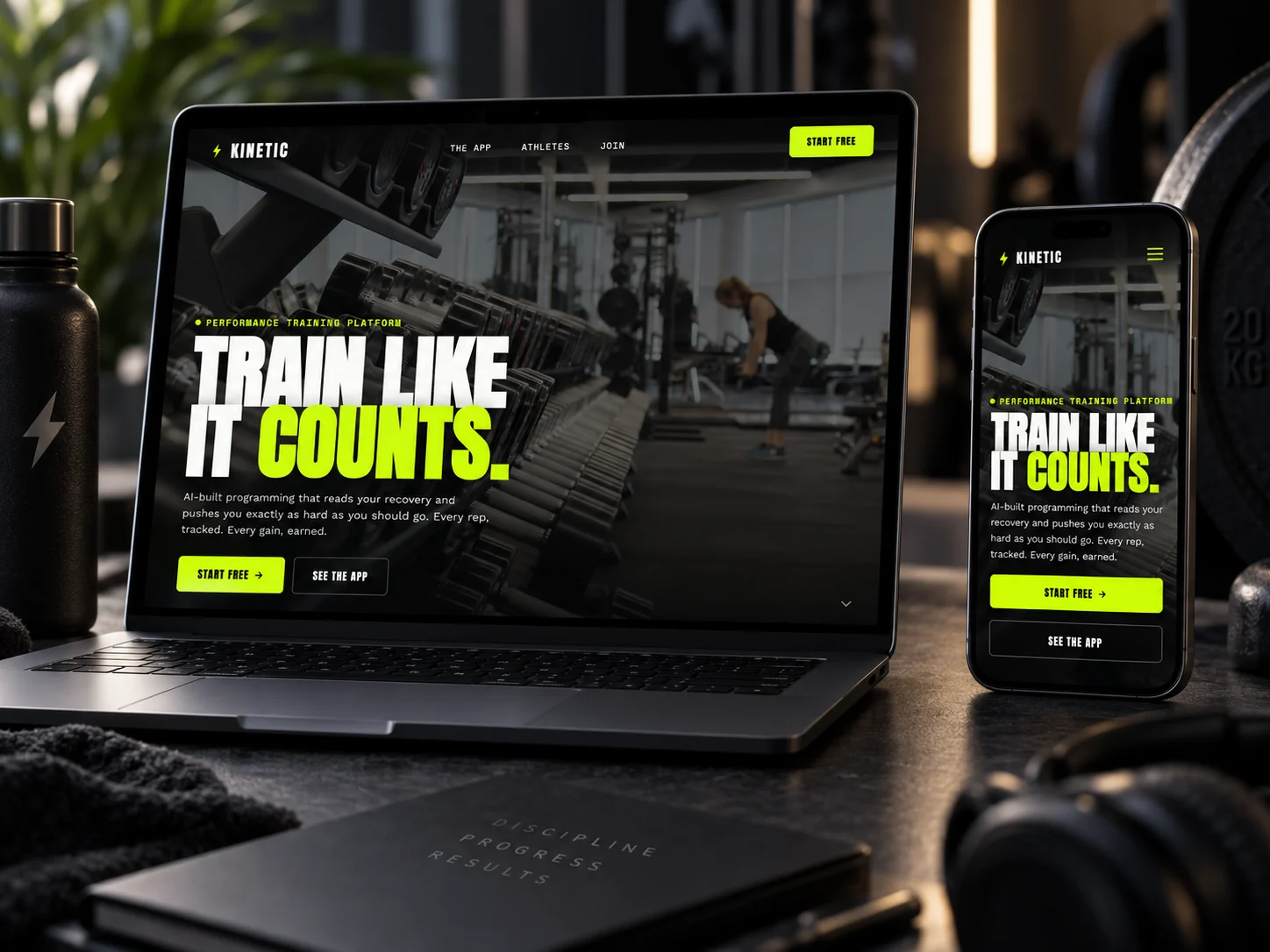 Kinetic's homepage on a laptop and a phone in a dark home gym