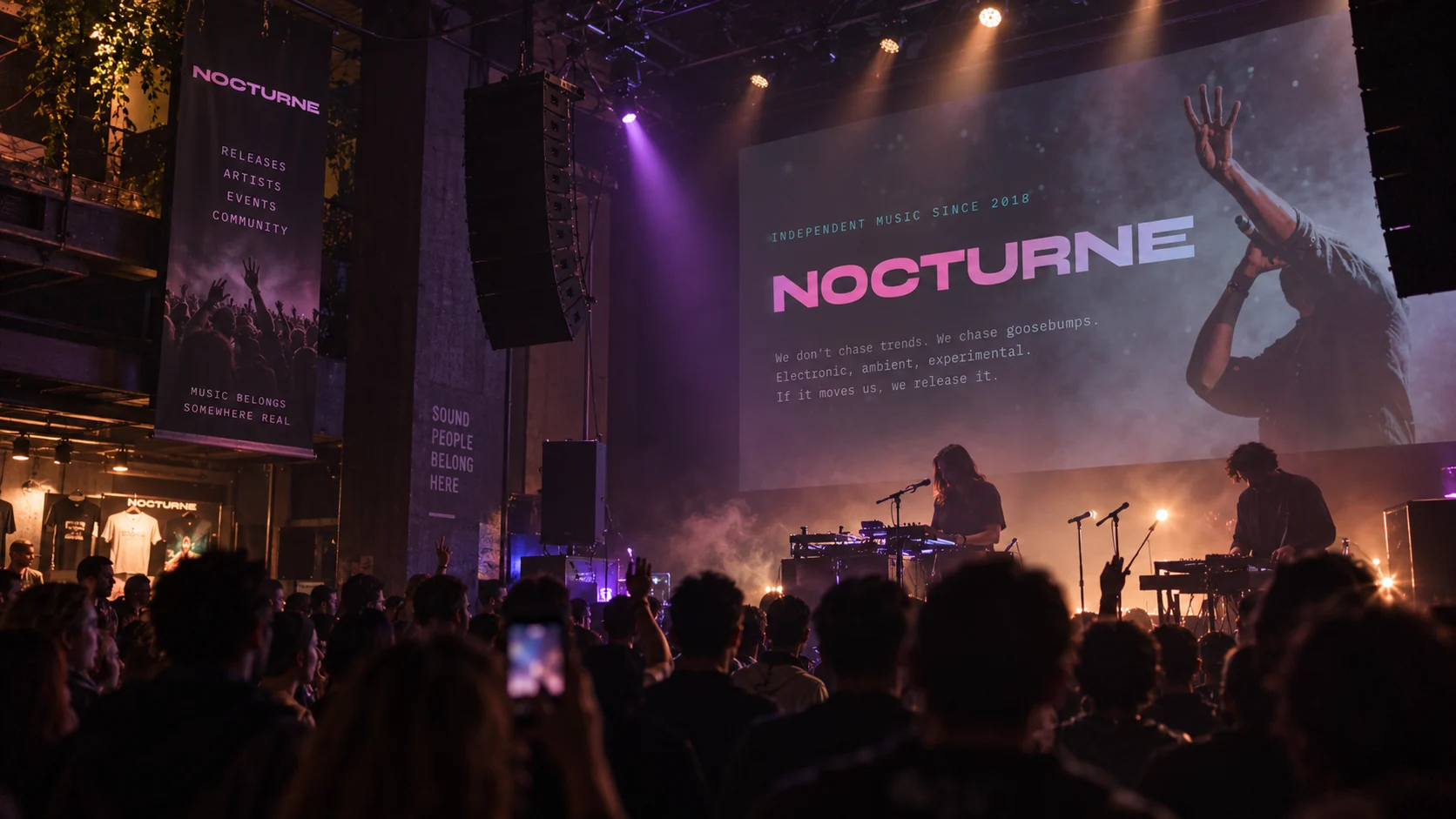 A band on stage with Nocturne projected behind them